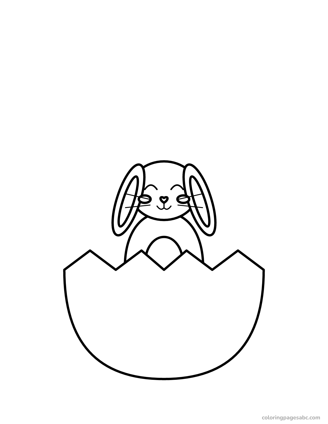 Bunny with floppy ears sitting in a big egg shell