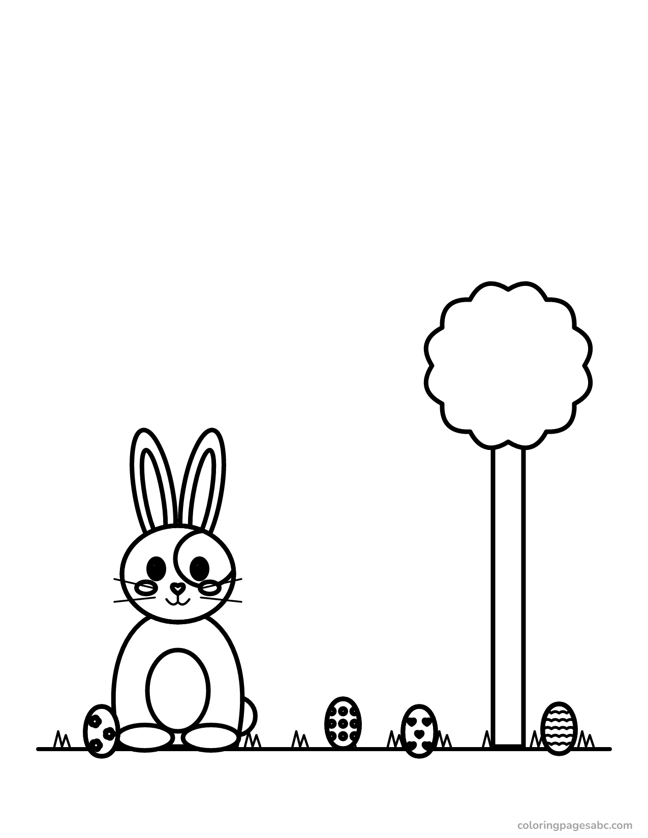 Bunny on an Easter egg hunt with eggs in the grass