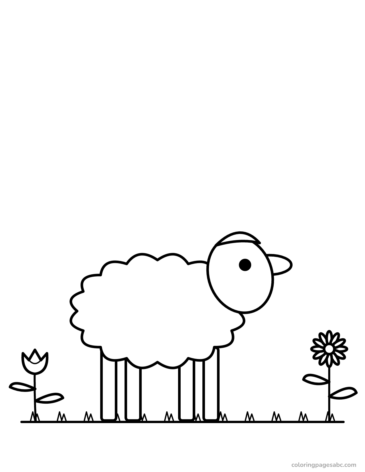 Woolly Easter lamb in the grass between flowers